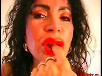 Strange Older Woman In Red Shows Holes